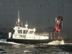 Gibraltar Pilots along side the QE2